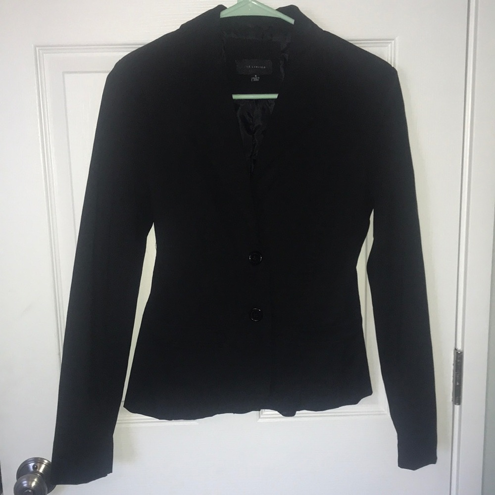 The limited black stretchy blazer size 4
